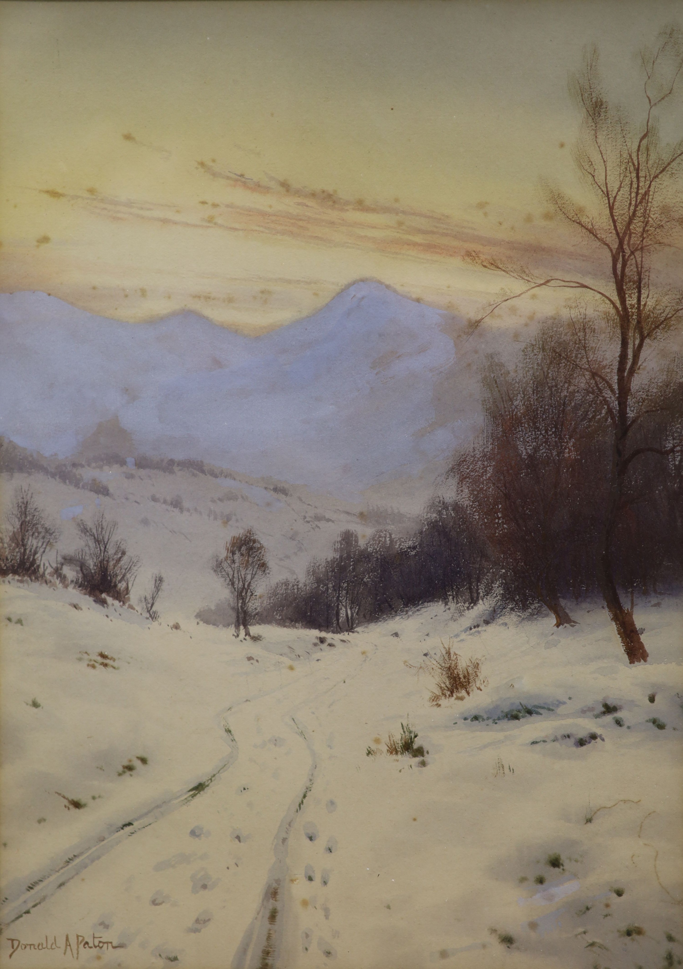 Donald A Paton (1886-1949), watercolour, ‘In the Grip of Winter, amongst the Fells, ..Lomond’, signed, 34 x 24cm.